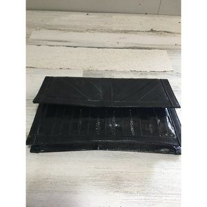 Eel skin black clutch bag with snap closure